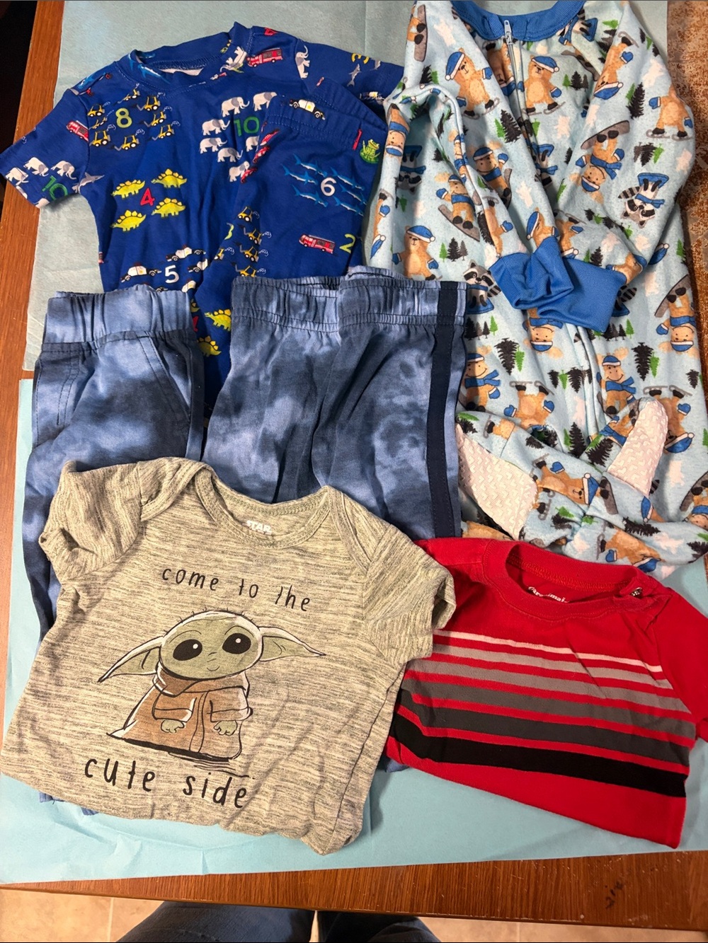 Assorted 6-9 mth. 2 pj. 2 pants. 1 onesie and 1 short sleeve